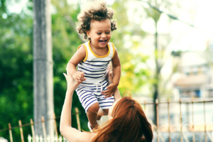 Mom playing with her kid. Too much screen time?